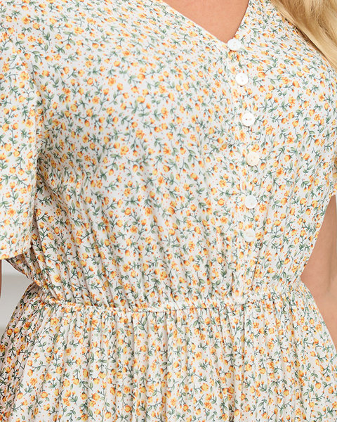 Biało-żółta rozkloszowana damska sukienka maxi w kwiaty - Odzież