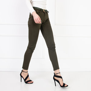 Damskie zielone jeansy typu rurki - Odzież