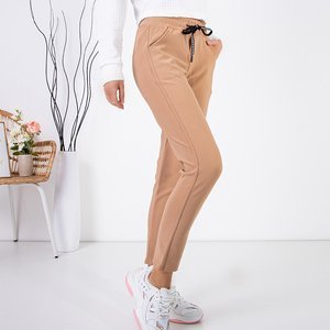 Jasnobrązowe damskie spodnie dresowe - Odzież
