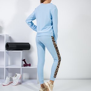 Niebieski damski komplet sportowy ze wstawkami w panterkę - Odzież