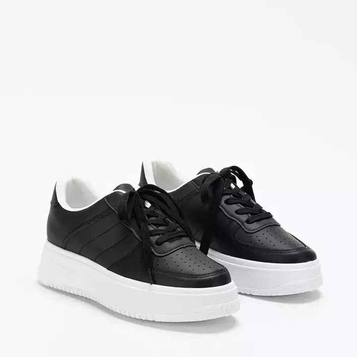 OUTLET Czarno - białe damskie buty sportowe na platformie Silvina - Obuwie