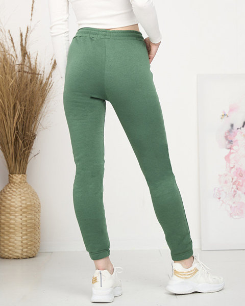 Royalfashion Zielone damskie spodnie dresowe z ociepleniem