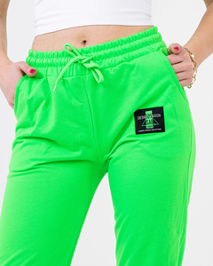 Неонові зелені жіночі спортивні штани