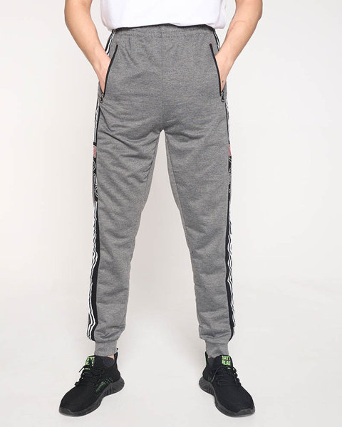 Сірі чоловічі спортивні штани з написами - Одяг