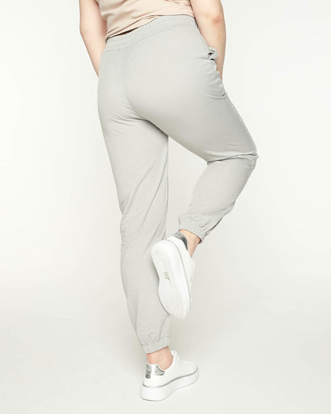 Жіночі джоггери сірого кольору з тканини PLUS SIZE - Одяг